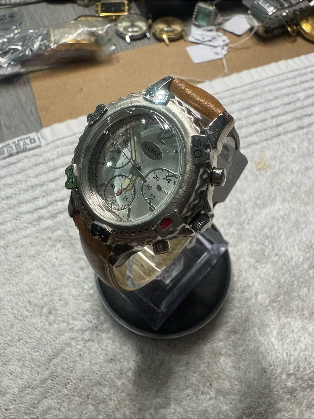 GUESS Men’s Silver Dial Chronograph Watch with Tan Leather Strap